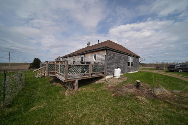 899 Golden Ridge Rd, Sherman, ME 04476 - rear view of house with a deck