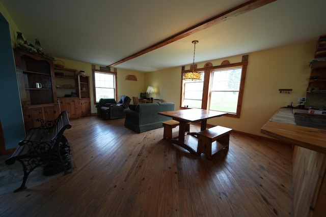 899 Golden Ridge Rd, Sherman, ME 04476 - dining area with beam ceiling and hardwood / wood-style floors