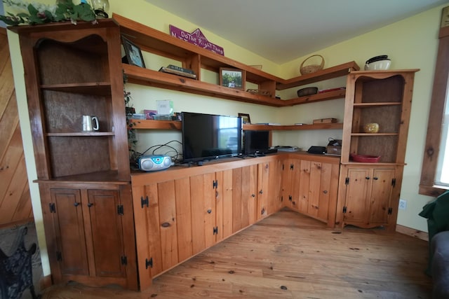 899 Golden Ridge Rd, Sherman, ME 04476 - unfurnished living room featuring light wood-style floors
