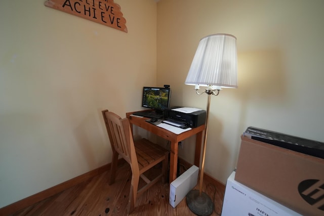 899 Golden Ridge Rd, Sherman, ME 04476 - office area with wood finished floors and baseboards