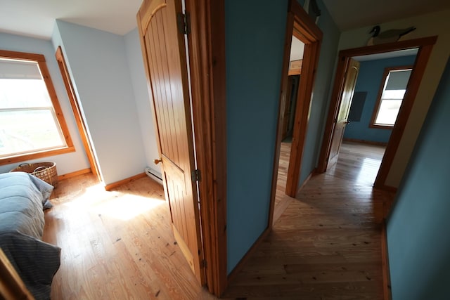 899 Golden Ridge Rd, Sherman, ME 04476 - hall with light wood-type flooring and baseboards