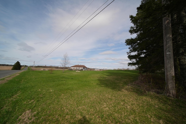 899 Golden Ridge Rd, Sherman, ME 04476 - view of green lawn featuring a rural view