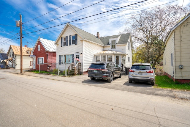 31 King St, Waterville, ME 04901 - traditional-style house with a chimney and a residential view