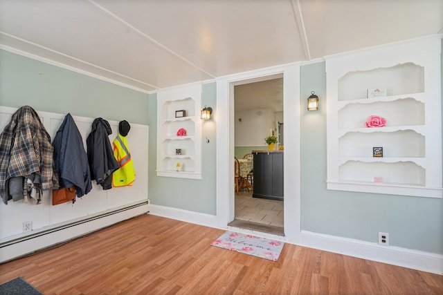 31 King St, Waterville, ME 04901 - mudroom with a baseboard heating unit, built in features, wood finished floors, and baseboards