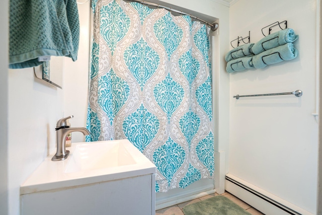 31 King St, Waterville, ME 04901 - bathroom with a baseboard radiator, a shower with shower curtain, vanity, and tile patterned floors