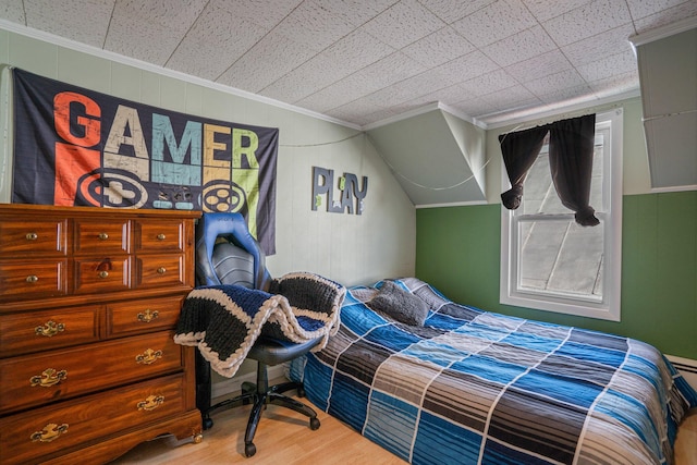 31 King St, Waterville, ME 04901 - bedroom with ornamental molding, wood finished floors, and wooden walls