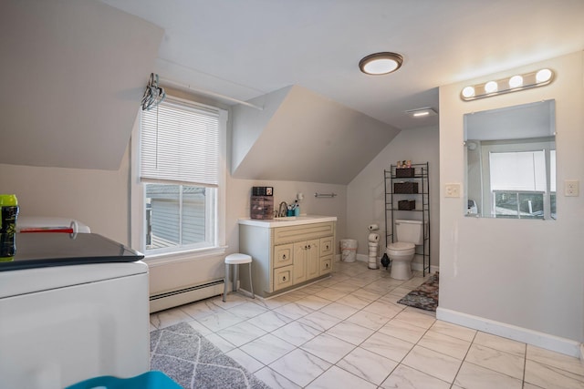 31 King St, Waterville, ME 04901 - bathroom with a baseboard radiator, vaulted ceiling, toilet, healthy amount of natural light, and baseboards