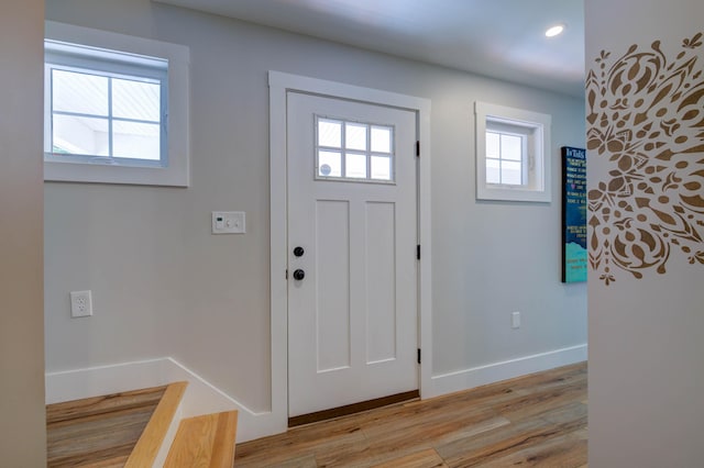 26 John Adams Ct, Naples, ME 04055 - entryway featuring plenty of natural light, light wood-style flooring, baseboards, and recessed lighting