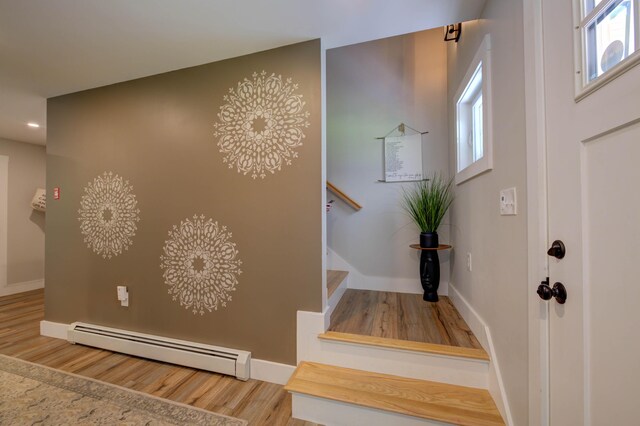 26 John Adams Ct, Naples, ME 04055 - entrance foyer featuring baseboard heating, wood finished floors, stairway, baseboards, and recessed lighting