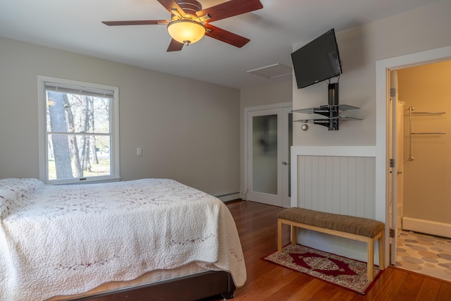 46 Silver Rdg, Veazie, ME 04401 - bedroom with a baseboard heating unit, wood finished floors, attic access, and ceiling fan