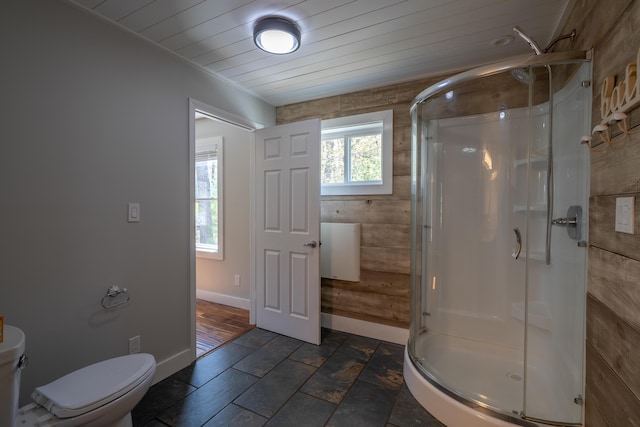 46 Silver Rdg, Veazie, ME 04401 - full bathroom featuring a shower stall, toilet, baseboards, and wooden ceiling