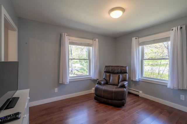 46 Silver Rdg, Veazie, ME 04401 - sitting room with a baseboard radiator, dark wood-type flooring, healthy amount of natural light, and baseboards
