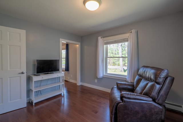46 Silver Rdg, Veazie, ME 04401 - living area featuring dark wood-style flooring, baseboards, and baseboard heating