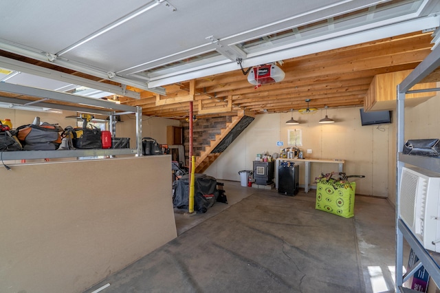 46 Silver Rdg, Veazie, ME 04401 - garage featuring a garage door opener