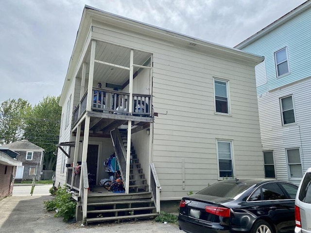 932 Lisbon St, Lewiston, ME 04240 - rear view of house featuring stairs
