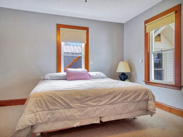 112 Buker Rd, Litchfield, ME 04350 - carpeted bedroom featuring baseboards