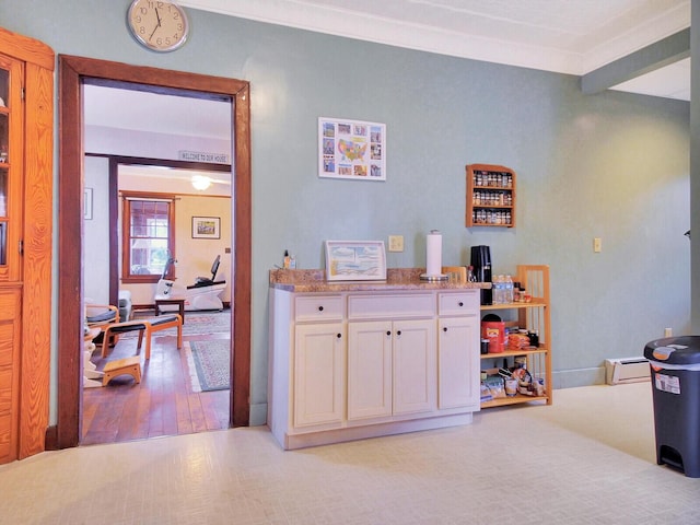 112 Buker Rd, Litchfield, ME 04350 - interior space featuring a baseboard radiator and light wood-type flooring
