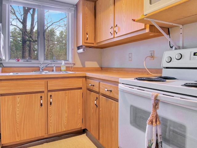 112 Buker Rd, Litchfield, ME 04350 - kitchen with white appliances, light countertops, and a sink