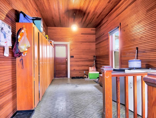 112 Buker Rd, Litchfield, ME 04350 - hall with wooden walls and wood ceiling