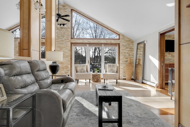 16 Gin Mill Ln, Windham, ME 04062 - living area featuring wood finished floors, a baseboard heating unit, and high vaulted ceiling
