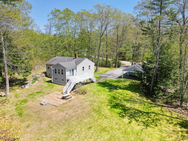 15 Northwood Ct, Wiscasset, ME 04578 - view of subject property featuring a heavily wooded area