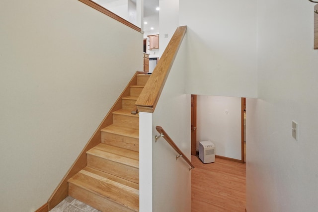 15 Northwood Ct, Wiscasset, ME 04578 - stairs featuring wood finished floors, baseboards, and recessed lighting