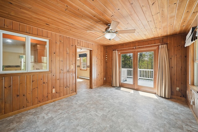 15 Northwood Ct, Wiscasset, ME 04578 - spare room featuring wooden walls, wooden ceiling, baseboard heating, baseboards, and a ceiling fan