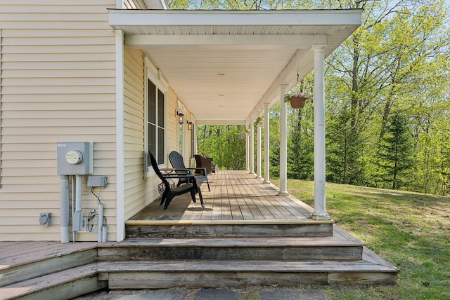 76 Asbury Ln, Acton, ME 04001 - wooden deck featuring covered porch
