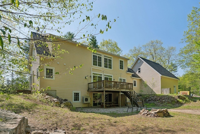 76 Asbury Ln, Acton, ME 04001 - rear view of property with an outdoor fire pit, a wooden deck, stairway, and ac unit