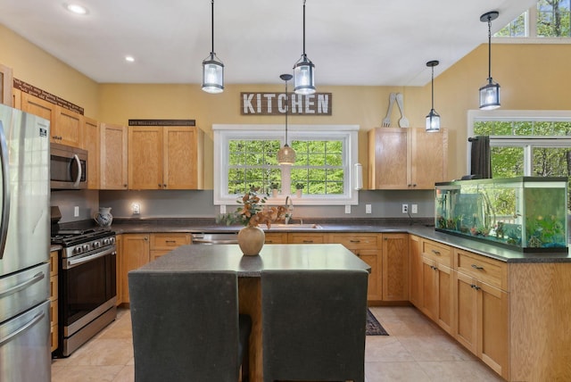 76 Asbury Ln, Acton, ME 04001 - kitchen featuring appliances with stainless steel finishes, a sink, light tile patterned flooring, healthy amount of natural light, and recessed lighting