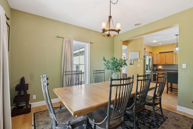 76 Asbury Ln, Acton, ME 04001 - dining area featuring a chandelier, light wood-type flooring, baseboards, and recessed lighting
