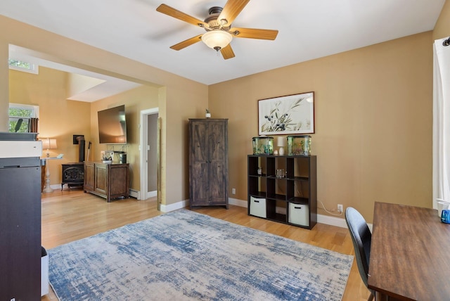 76 Asbury Ln, Acton, ME 04001 - office area with light wood finished floors, a ceiling fan, and baseboards