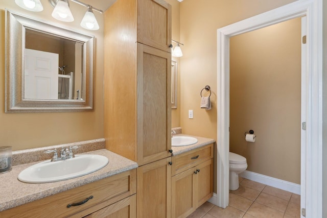 76 Asbury Ln, Acton, ME 04001 - full bathroom with toilet, tile patterned flooring, and vanity