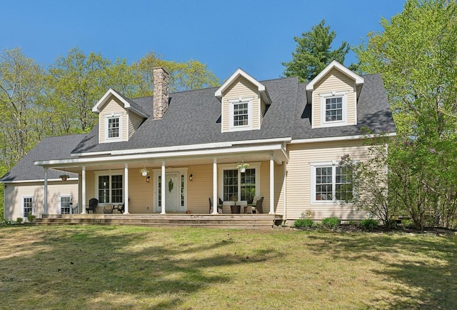 76 Asbury Ln, Acton, ME 04001 - cape cod house with a front yard, a chimney, a porch, and a shingled roof
