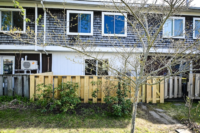 57 Mountfort St, Portland, ME 04101 - view of side of home with ac unit and fence