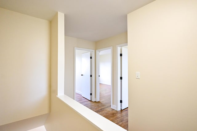 57 Mountfort St, Portland, ME 04101 - hall with dark wood-type flooring and baseboards