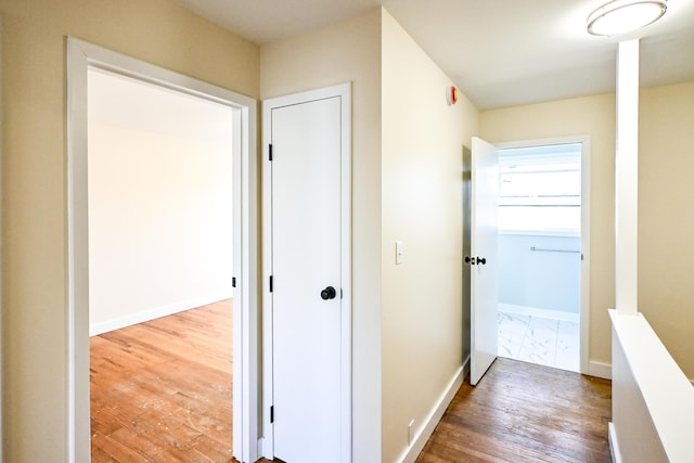 57 Mountfort St, Portland, ME 04101 - hallway featuring wood finished floors and baseboards