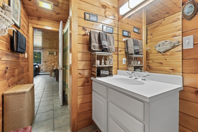 35 Burnt Mill Rd Unit B, Wells, ME 04090 - bathroom featuring wood walls, tile patterned floors, vanity, and wooden ceiling