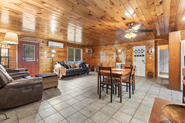 35 Burnt Mill Rd Unit B, Wells, ME 04090 - dining room with a wall unit AC, wooden ceiling, a ceiling fan, light tile patterned floors, and a wall mounted AC