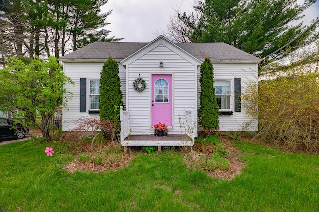 40 Merrow Rd, Auburn, ME 04210 - view of front of home featuring a front lawn and roof with shingles