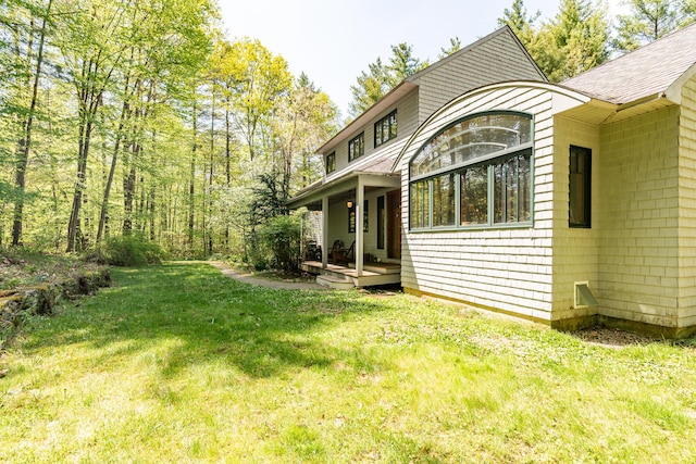 43 Creek Xing, Eliot, ME 03903 - view of grassy yard featuring covered porch