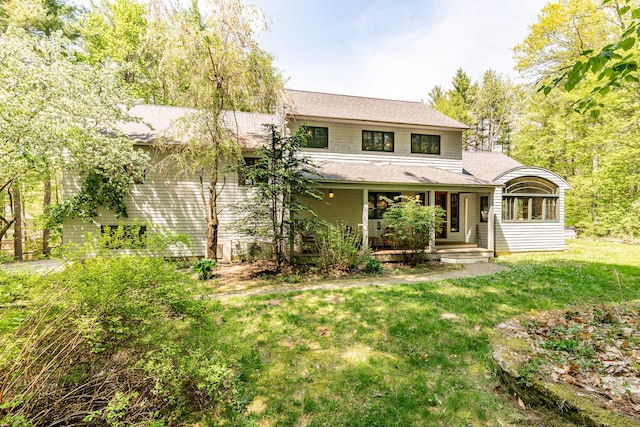 43 Creek Xing, Eliot, ME 03903 - view of front of property featuring a front lawn, covered porch, and a shingled roof