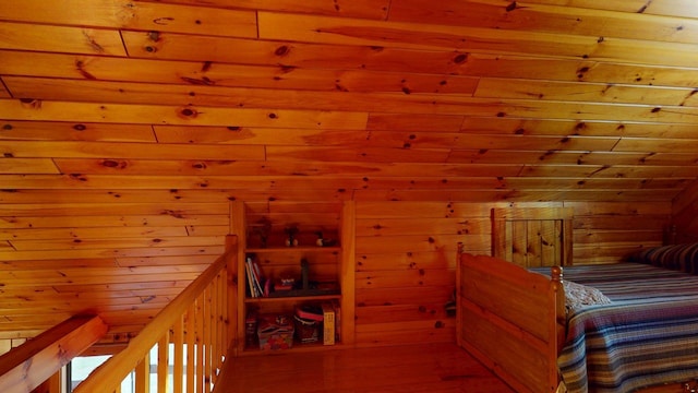 23 Pine Knoll Rd, Bowerbank, ME 04426 - bedroom featuring a relaxing sauna, wood finished floors, and wooden walls