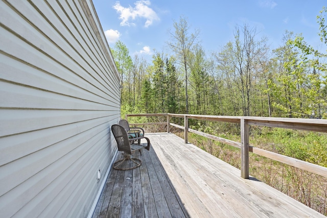 54 Whitten Rd, Clinton, ME 04927 - deck featuring a view of trees