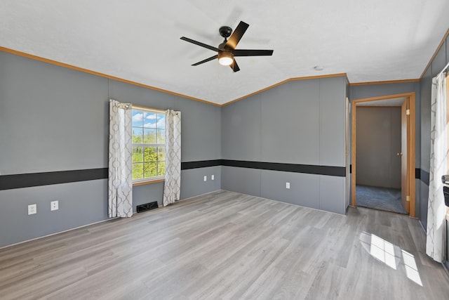 54 Whitten Rd, Clinton, ME 04927 - unfurnished room featuring wood finished floors, ceiling fan, and vaulted ceiling
