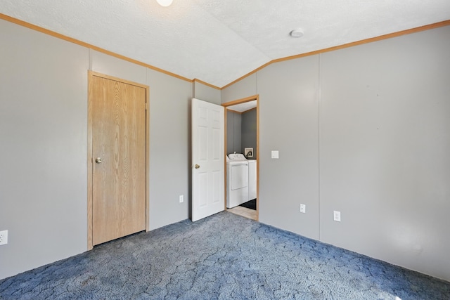 54 Whitten Rd, Clinton, ME 04927 - unfurnished bedroom with separate washer and dryer, ornamental molding, carpet flooring, and vaulted ceiling