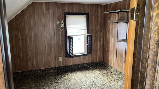 706 Crescent Ave, Rumford, ME 04276 - spare room with a textured ceiling and wood walls