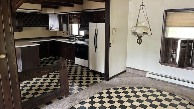 706 Crescent Ave, Rumford, ME 04276 - kitchen featuring freestanding refrigerator, electric range, tile patterned floors, a sink, and light countertops