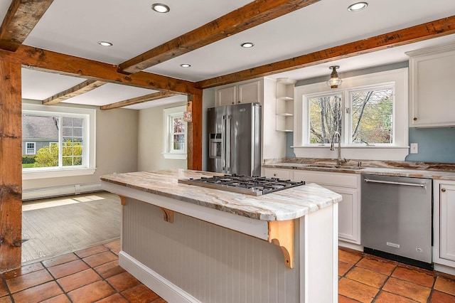 456 Ferry Rd, Saco, ME 04072 - kitchen featuring appliances with stainless steel finishes, a sink, beamed ceiling, a baseboard radiator, and a kitchen island