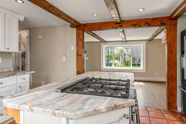 456 Ferry Rd, Saco, ME 04072 - kitchen with beam ceiling, a baseboard radiator, white cabinets, a center island, and recessed lighting